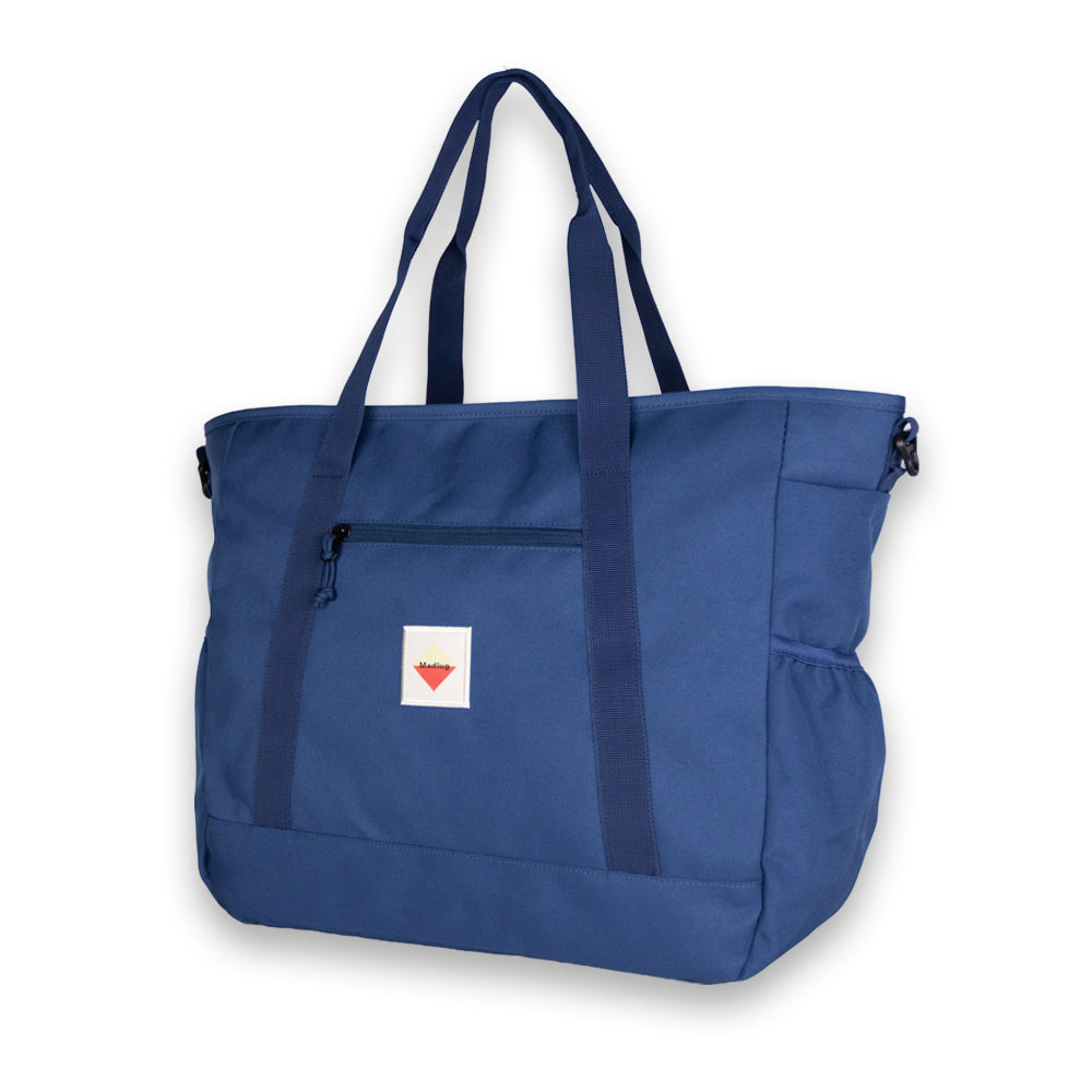 Midnight Blue Outbound Tote. Three-quarter view.