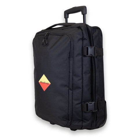 Madlug Black Cabin Suitcase. Side view showing tow-handle and locking clips.