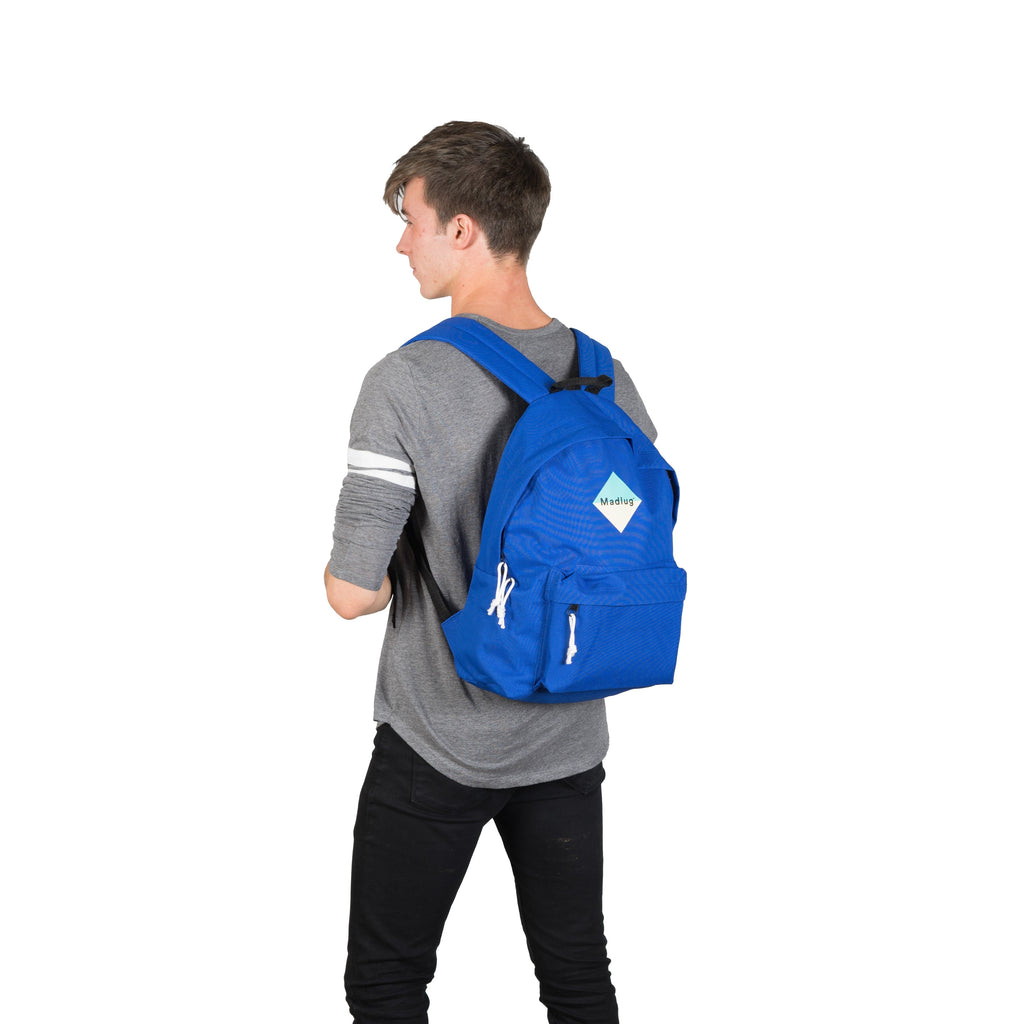 Madlug Classic Backpack in Blue. Male model rear view.