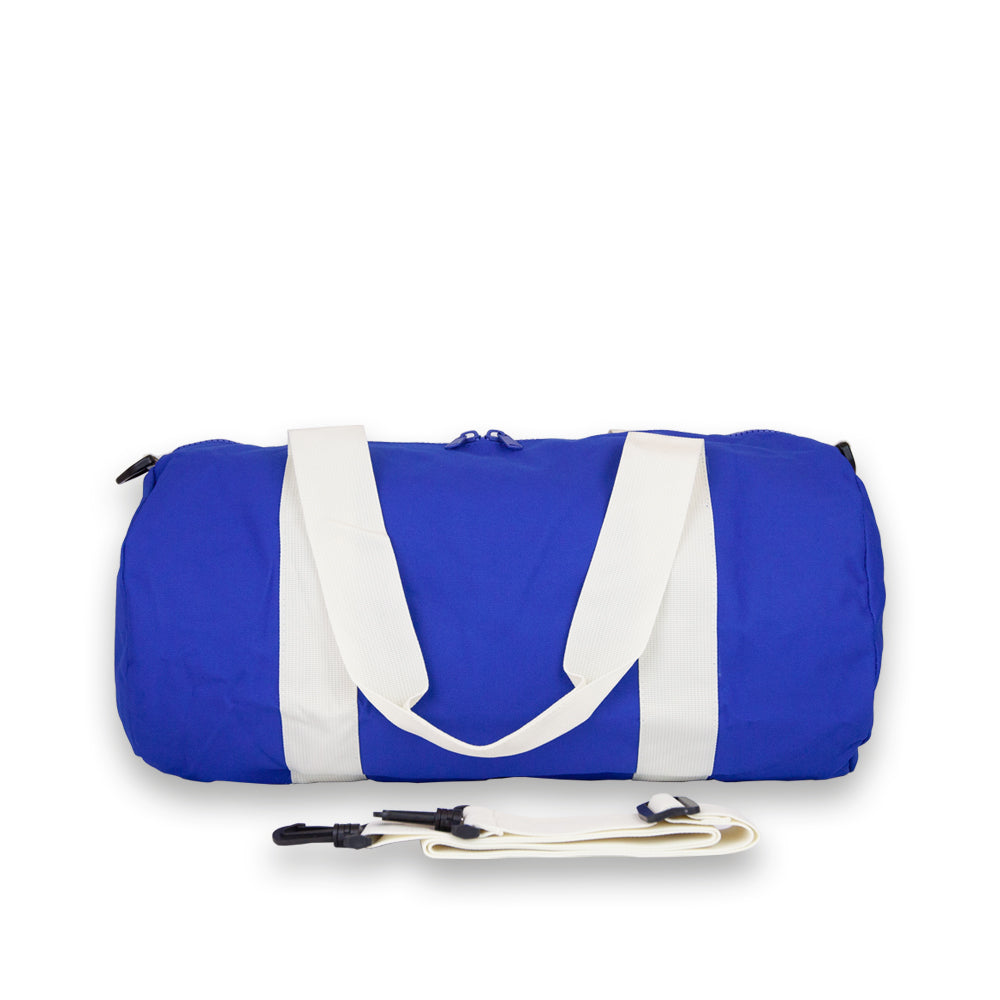 Duffel bag in Blue. Rear view showing detachable shoulder strap.