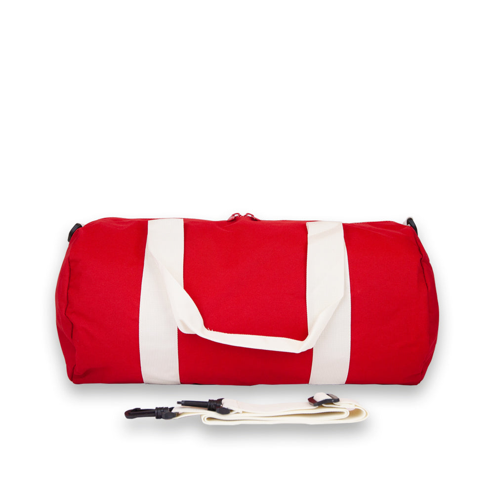 Duffel bag in Red. Rear view showing detachable shoulder strap.